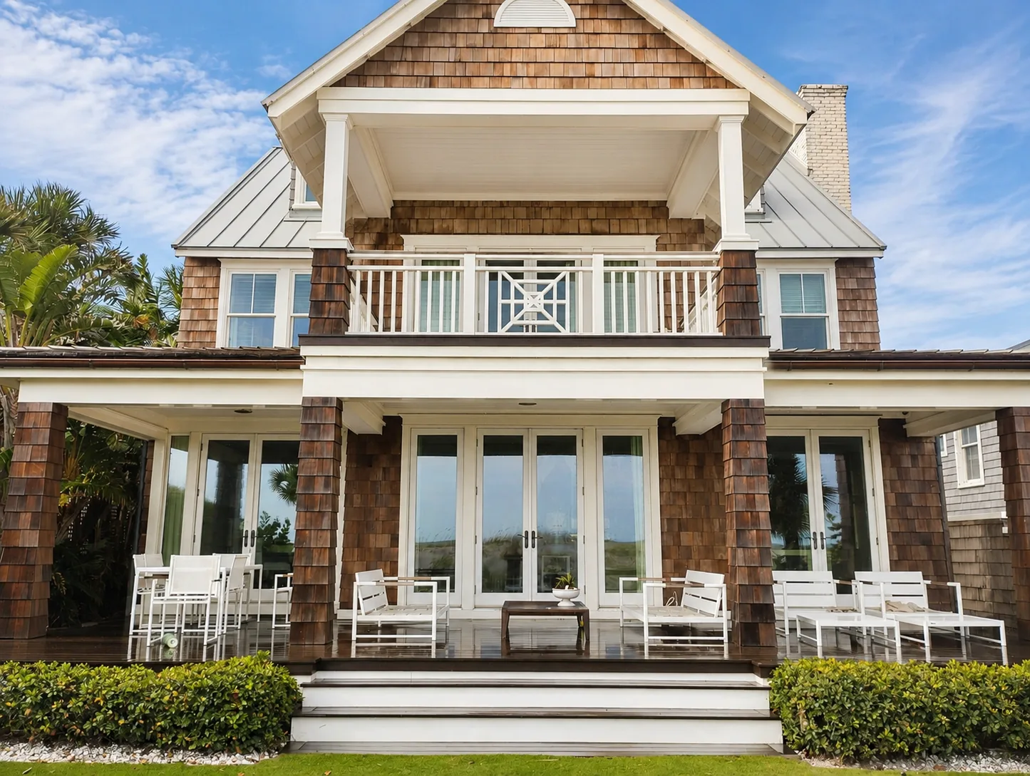 A cedar shingle oceanfront home, rear porch and balcony