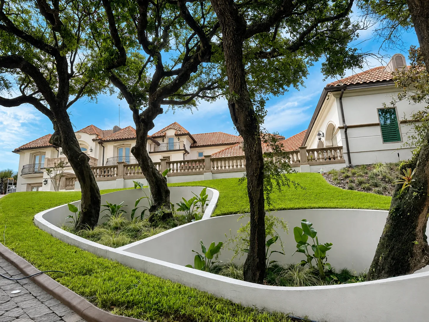 The same planter walls after, clean bright white